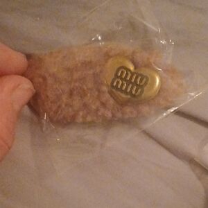 Miu Miu Tan Fuzzy Hair Clip with Gold Heart Logo